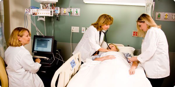 Photo of hospital staff treating patient